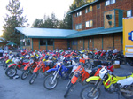 thelodge parking lot begins to fill as riders trail in