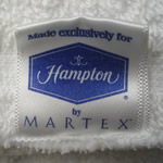 hampton inn's branding extdends to their own bath towel labeling